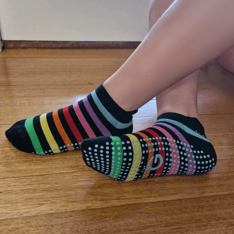 Rainbow_socks_relaxed_at_door_fdae9ca8-aa39-4c74-bde9-0dfe73cbb432.png